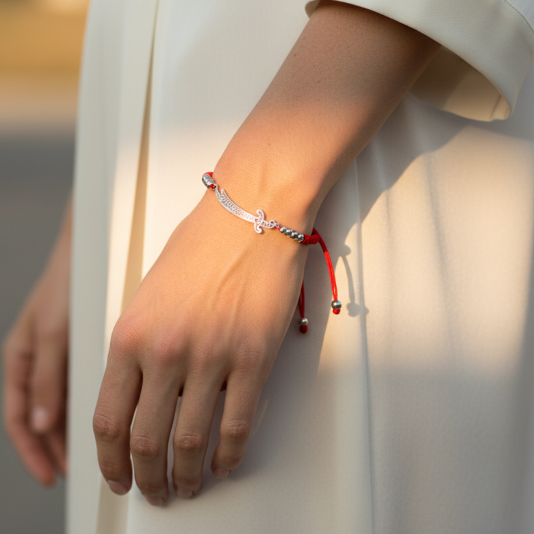 Qamar Zulfiqar Red Bracelet